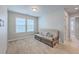 Cozy bedroom with neutral carpet and natural light from two large windows at 787 Redbud Ln, Summerville, SC 29486