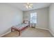bedroom featuring a bed, shelf with toys, carpet and a ceiling fan for added comfort at 787 Redbud Ln, Summerville, SC 29486