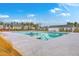 Spacious community pool with lounge chairs and a covered area for relaxing by the water at 787 Redbud Ln, Summerville, SC 29486