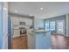 Open concept kitchen with granite countertops, stainless appliances, and a breakfast bar at 787 Redbud Ln, Summerville, SC 29486