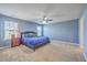 Spacious bedroom with plush carpeting, a ceiling fan, and natural light at 787 Redbud Ln, Summerville, SC 29486