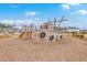 Community playground with a wooden ship play structure and plenty of room to play at 787 Redbud Ln, Summerville, SC 29486
