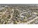 Aerial view showcasing a residential neighborhood with well-maintained homes, tree-lined streets, and community amenities at 8005 Old Hazelwood Rd, North Charleston, SC 29406