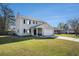 Charming two-story home with grey siding, black shutters, and an attached two-car garage at 8005 Old Hazelwood Rd, North Charleston, SC 29406