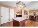 Spacious kitchen featuring island and open view to dining and living areas at 8005 Old Hazelwood Rd, North Charleston, SC 29406