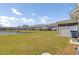 View of the home's backyard featuring a pond at 9712 Transplanter Cir, Ladson, SC 29456