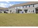 View of the home's backyard at 9712 Transplanter Cir, Ladson, SC 29456