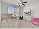 Bedroom featuring a ceiling fan and lots of natural light at 9712 Transplanter Cir, Ladson, SC 29456