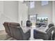 Bright living room with vaulted ceilings and view of backyard pond at 9712 Transplanter Cir, Ladson, SC 29456