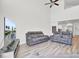 Comfortable living room featuring modern furniture and high ceilings at 9712 Transplanter Cir, Ladson, SC 29456