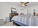 Neutral bedroom featuring a ceiling fan and lots of natural light at 9712 Transplanter Cir, Ladson, SC 29456