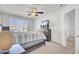 Neutral bedroom featuring a ceiling fan and lots of natural light at 9712 Transplanter Cir, Ladson, SC 29456