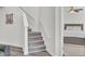 Carpeted staircase leading to the upstairs area at 9712 Transplanter Cir, Ladson, SC 29456