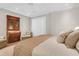 Bedroom featuring a king-size bed, hardwood floors, and natural light at 1 Vendue Range # D, Charleston, SC 29401
