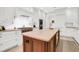 Modern kitchen featuring a large island, stainless steel appliances, and plenty of storage at 1 Vendue Range # D, Charleston, SC 29401