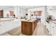 Kitchen features a large center island, modern appliances, and custom cabinetry at 1 Vendue Range # D, Charleston, SC 29401