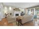 Cozy living room shows a fireplace, recessed lighting, and comfortable seating arrangements at 1 Vendue Range # D, Charleston, SC 29401