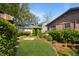 Well maintained grass section of backyard, perfect for leisure and play at 1039 Grand Concourse St, Charleston, SC 29412