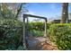 Hanging seat swing in backyard amongst lush plants and greenery at 1039 Grand Concourse St, Charleston, SC 29412