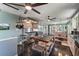 Spacious kitchen with stainless steel appliances, center island, and unique hanging pot rack at 1039 Grand Concourse St, Charleston, SC 29412
