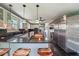 Kitchen with stainless steel appliances, dark countertops, and breakfast bar with seating at 1039 Grand Concourse St, Charleston, SC 29412