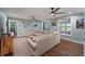 Spacious living room with comfortable sectional, hardwood floors, and views into the dining area at 1039 Grand Concourse St, Charleston, SC 29412