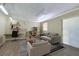 Living room featuring a desk, sofa, chair, and shelves at 1039 Grand Concourse St, Charleston, SC 29412