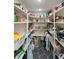 Well-organized walk-in pantry with ample shelving for storage at 1039 Grand Concourse St, Charleston, SC 29412