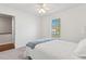 Bedroom featuring ceiling fan, window with blinds, and connecting doorway at 115 Laurel Ridge Rd, North Charleston, SC 29418