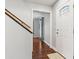 Inviting entryway features hardwood floors, a staircase, and a bright white front door at 115 Laurel Ridge Rd, North Charleston, SC 29418