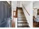 Welcoming entryway with hardwood stairs and a view into the living space at 115 Laurel Ridge Rd, North Charleston, SC 29418