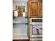 Charming kitchen area featuring open shelving and stainless-steel appliances, perfect for culinary enthusiasts at 115 Laurel Ridge Rd, North Charleston, SC 29418