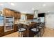 Updated kitchen with wooden cabinets, stainless appliances, and breakfast bar with seating at 115 Laurel Ridge Rd, North Charleston, SC 29418