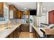 Modern kitchen featuring stainless steel appliances, tile backsplash, and ample counter space at 115 Laurel Ridge Rd, North Charleston, SC 29418