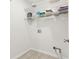 Bright laundry room featuring wire shelving and tile flooring for easy maintenance and plenty of storage space at 115 Laurel Ridge Rd, North Charleston, SC 29418