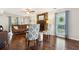 Cozy living room with a brick fireplace, hardwood floors, and natural light at 115 Laurel Ridge Rd, North Charleston, SC 29418