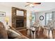 Comfortable living room features a brick fireplace and hardwood floors at 115 Laurel Ridge Rd, North Charleston, SC 29418
