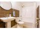 Nicely remodeled bathroom featuring a pedestal sink, toilet, and shower/tub combination at 117 Loblolly Ln, Summerville, SC 29483
