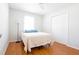 Bright bedroom featuring a spacious closet and hardwood floors at 117 Loblolly Ln, Summerville, SC 29483