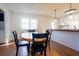 Eat-in kitchen with a breakfast bar and access to the laundry room at 117 Loblolly Ln, Summerville, SC 29483