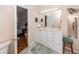 Bathroom featuring a vanity with drawers, a small stool and an entrance to the bedroom at 1233 Bridgeport Dr, Mount Pleasant, SC 29466