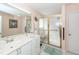 Bathroom featuring a glass shower, vanity with white cabinets and a large mirror at 1233 Bridgeport Dr, Mount Pleasant, SC 29466