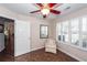 Bedroom with wood floors, white walls and a window with shutters at 1233 Bridgeport Dr, Mount Pleasant, SC 29466