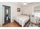 Comfortable bedroom features a ceiling fan, window, and ensuite bathroom access at 1233 Bridgeport Dr, Mount Pleasant, SC 29466