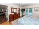 Bright bedroom with a ceiling fan, dresser, and access to a sunroom through glass doors at 1233 Bridgeport Dr, Mount Pleasant, SC 29466