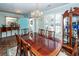Formal dining area featuring a large table, a chandelier, and an open view to the entryway at 1233 Bridgeport Dr, Mount Pleasant, SC 29466