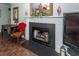 Close up view of fireplace with traditional mantel and tile surround at 1233 Bridgeport Dr, Mount Pleasant, SC 29466
