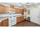 Well-lit kitchen with ample cabinet space, modern appliances, and tiled backsplash at 1233 Bridgeport Dr, Mount Pleasant, SC 29466