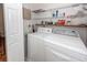 Laundry room with a washer and dryer and wire shelving units at 1233 Bridgeport Dr, Mount Pleasant, SC 29466