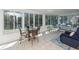 Spacious sunroom for relaxing features many windows with a view of the water at 1233 Bridgeport Dr, Mount Pleasant, SC 29466